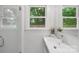 Bright bathroom features sleek vanity and enclosed glass shower at 545 Dilworth Mews Ct, Charlotte, NC 28203
