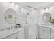 Modern bathroom features dual vanity sinks and a glass-enclosed walk-in shower at 545 Dilworth Mews Ct, Charlotte, NC 28203