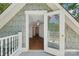 Bedroom featuring hardwood floors, ceiling fan, and doorway to a deck at 545 Dilworth Mews Ct, Charlotte, NC 28203