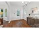 Charming entryway with hardwood floors, a decorative glass door, a stylish cabinet, and lots of natural light at 545 Dilworth Mews Ct, Charlotte, NC 28203
