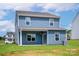 Spacious backyard with a covered patio, perfect for outdoor entertaining and relaxation at 5626 Skinny Dr, Charlotte, NC 28215