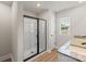 Modern bathroom with a glass-enclosed shower, dual vanities, and sleek fixtures at 5626 Skinny Dr, Charlotte, NC 28215