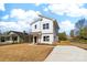 Exterior of a two-story modern home with a minimalist design and a freshly laid driveway at 600 Legrand St, Shelby, NC 28150