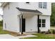 Charming, newly built home featuring a covered front porch with black accents and modern design at 600 Legrand St, Shelby, NC 28150