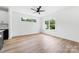 Bright and open living room with modern flooring and multiple windows at 600 Legrand St, Shelby, NC 28150