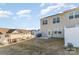 Backyard of a newly built townhome with a small patio and lawn at 6048 Chelsea Oaks Rdg, Tega Cay, SC 29708