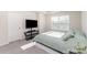 Cozy bedroom with natural light and carpeting at 6048 Chelsea Oaks Rdg, Tega Cay, SC 29708