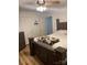 Cozy bedroom featuring a large wooden bed frame and laminate flooring at 705 Sagrada Dr, York, SC 29745