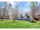 Charming home with a spacious front yard, covered porch, and attached garage on a sunny day at 705 Sagrada Dr, York, SC 29745