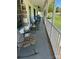 Inviting front porch featuring rocking chairs and charming decor, perfect for relaxing outdoors at 705 Sagrada Dr, York, SC 29745