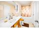 This is a bathroom with a shower and tub combo, a white sink, and a toilet at 9220 Pinaceal Ct, Charlotte, NC 28215