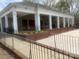 Community clubhouse featuring an open porch, ceiling fans, a ramp, and outdoor seating at 9220 Pinaceal Ct, Charlotte, NC 28215