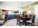 Inviting living and dining areas with sliding glass door access to backyard at 9220 Pinaceal Ct, Charlotte, NC 28215