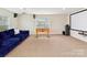 Spacious basement featuring home theater system, foosball table, and comfortable seating area at 9895 Travertine Trl, Davidson, NC 28036