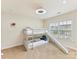 Cozy bedroom featuring a bunk bed with slide, complemented by a unique ceiling light fixture at 9895 Travertine Trl, Davidson, NC 28036