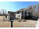 Community library with books and neighborhood information at 9895 Travertine Trl, Davidson, NC 28036
