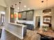 Modern kitchen featuring stainless steel appliances and pendant lighting at 1021 Mccollum Oaks Ln, Monroe, NC 28110
