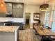 Modern kitchen features gray cabinets, granite countertops, and stainless steel appliances at 1021 Mccollum Oaks Ln, Monroe, NC 28110