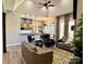 Bright living room with modern furniture and open floor plan at 1021 Mccollum Oaks Ln, Monroe, NC 28110