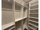 Spacious walk-in closet with built-in shelving and organization system to maximize storage at 1021 Mccollum Oaks Ln, Monroe, NC 28110