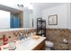 Bathroom with stylish tile accents, a modern vanity, and a large mirror at 103 Perry St, Shelby, NC 28150