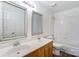 Bright bathroom featuring a double sink vanity, a tub and shower combo at 10434 Henbane Ct, Charlotte, NC 28213