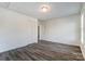 Bedroom featuring light colored walls and vinyl flooring at 10434 Henbane Ct, Charlotte, NC 28213