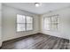 Inviting bedroom featuring large windows for ample natural light at 10434 Henbane Ct, Charlotte, NC 28213