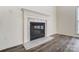 A gas fireplace featuring a white marble surround at 10434 Henbane Ct, Charlotte, NC 28213
