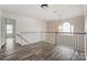 Upstairs loft area with a window at 10434 Henbane Ct, Charlotte, NC 28213