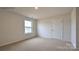 Bedroom featuring a window, plush carpeting, and neutral walls at 1059 Horizon St, Chester, SC 29706