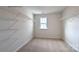 Spacious walk-in closet featuring carpet floors and wire shelving at 1059 Horizon St, Chester, SC 29706