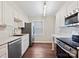 Modern kitchen features stainless steel appliances and eat-in breakfast counter at 107 S Laurel Ave # 101A, Charlotte, NC 28207