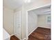 Living room features hardwood floors and neutral paint at 107 S Laurel Ave # 101A, Charlotte, NC 28207