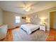Bright bedroom with hardwood floors, neutral paint, ceiling fan, and natural light at 1115 Kelly Rd, Mount Holly, NC 28120