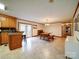 Open dining room area with access to the kitchen and outdoor spaces, perfect for entertaining at 1115 Kelly Rd, Mount Holly, NC 28120
