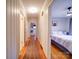 Hallway featuring hardwood floors and access to the bedrooms at 1115 Kelly Rd, Mount Holly, NC 28120