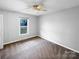 A light, minimalist bedroom features natural light and ample empty space at 1125 Twin Lakes Rd, Rock Hill, SC 29732