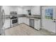 Updated kitchen featuring stainless appliances and stone countertops at 1125 Twin Lakes Rd, Rock Hill, SC 29732