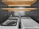 Updated laundry room boasts built in shelving at 1125 Twin Lakes Rd, Rock Hill, SC 29732