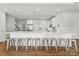 Spacious kitchen with a large island, white cabinets, and stainless steel appliances provides ample seating at 12014 James Jack Ln, Charlotte, NC 28277