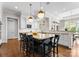 Bright kitchen with an island and barstool seating with backyard views at 12014 James Jack Ln, Charlotte, NC 28277