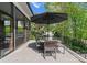 Outdoor dining area featuring a table, chairs, grill, and screened-in porch, ideal for entertaining guests at 12014 James Jack Ln, Charlotte, NC 28277