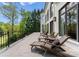 Balcony with lounge chairs offers a relaxing outdoor space with serene views of the surrounding landscape at 12014 James Jack Ln, Charlotte, NC 28277