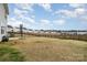 Spacious backyard with a metal fence overlooking the neighborhood at 129 Doncaster Dr, Mooresville, NC 28115