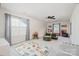 Bright bonus room with natural light, playful decor, and ample space for recreation and relaxation at 129 Doncaster Dr, Mooresville, NC 28115