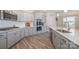 Charming kitchen with white countertops, subway tile backsplash and stainless appliances at 129 Doncaster Dr, Mooresville, NC 28115