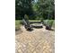 Outdoor fire pit surrounded by Adirondack chairs at 13240 Carolina Wren Ct, Charlotte, NC 28278