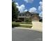 Charming two-story home with a manicured lawn, beautiful landscaping, and inviting curb appeal at 13240 Carolina Wren Ct, Charlotte, NC 28278