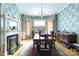 Spacious dining room with a large table, elegant chandelier, and classic wallpaper, perfect for Gathering gatherings at 143 Reid St, Rock Hill, SC 29730